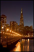 Transamerica Pyramid and Pier seven reflections at night. San Francisco, California, USA