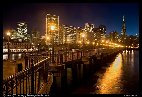 Embarcadero and Transamerica Pyramid seen from Pier 7 at night. San Francisco, California, USA (color)