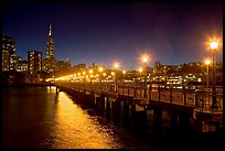 Skyline, Pier 7 lights and reflections at night. San Francisco, California, USA (color)