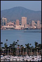 Yachts, skyline, and San Miguel Mountain, dusk. San Diego, California, USA ( color)
