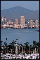 Yachts, skyline, and San Miguel Mountain, dusk. San Diego, California, USA (color)