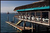 Restaurant at the edge of harbor. San Diego, California, USA (color)