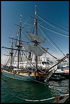 Maritime Museum with HMS Surprise and ferryboat Berkeley. San Diego, California, USA (color)