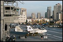 Flight control tower, aircraft, San Diego skyline, USS Midway aircraft carrier. San Diego, California, USA (color)