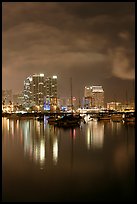 Yachts and skyline from Harbor Drive, at night. San Diego, California, USA (color)