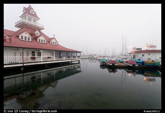 Period and modern boathouses in fog, Coronado. San Diego, California, USA