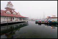 Period and modern boathouses in fog, Coronado. San Diego, California, USA