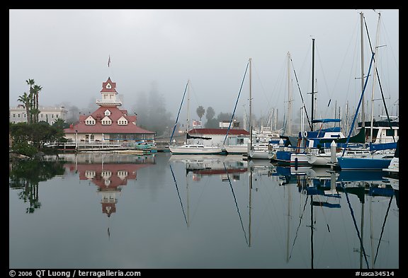 Boats and historic Coronado boathouse in fog. San Diego, California, USA (color)