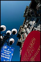 Gaslamp, signs, and facade of the Louis Bank of Commerce, Gaslamp quarter. San Diego, California, USA