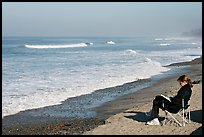 Woman reading on the beach. La Jolla, San Diego, California, USA (color)