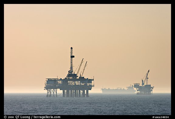 Off-shore drilling platforms and tanker. Huntington Beach, Orange County, California, USA