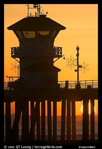 Lifeguard tower on Huntington Pier at sunset. Huntington Beach, Orange County, California, USA