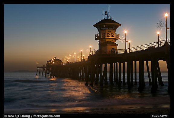 Huntington Pier lights at twilight. Huntington Beach, Orange County, California, USA