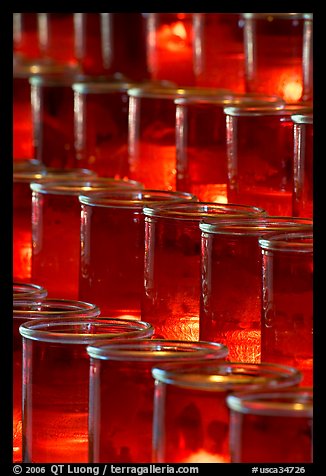 Red candles in glass, sharp. San Juan Capistrano, Orange County, California, USA (color)