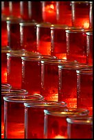 Red candles in glass, sharp. San Juan Capistrano, Orange County, California, USA (color)