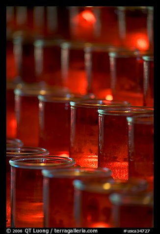 Candles in red glass, background blurred. San Juan Capistrano, Orange County, California, USA (color)