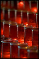 Candles in red glass, background blurred. San Juan Capistrano, Orange County, California, USA