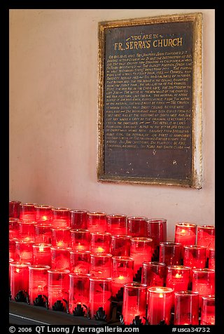 Rows of candles and sign commemorating Father Serra. San Juan Capistrano, Orange County, California, USA