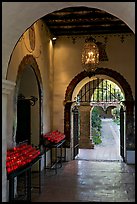 Corridor with candles next to the Serra Chapel. San Juan Capistrano, Orange County, California, USA