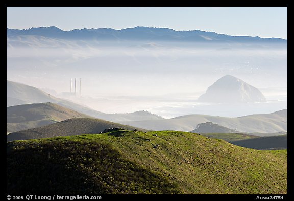 Power plant and Morro Rock seen from hills. California, USA