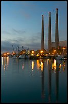 Power station reflected in harbor, dusk. Morro Bay, USA