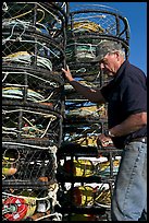 Man loading crab traps. Morro Bay, USA ( color)
