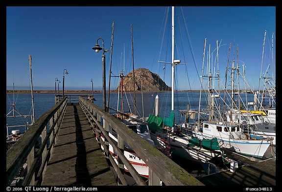 Deck, harbor, and Morro Rock. Morro Bay, USA