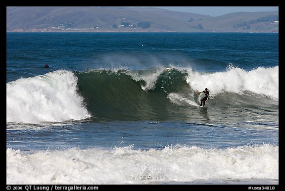 Surfer and wave. Morro Bay, USA