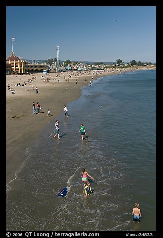 Children playing on the beach. Santa Cruz, California, USA