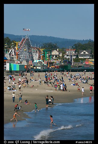 Children, beach, and boardwalk. Santa Cruz, California, USA