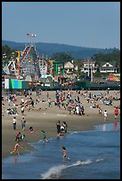 Children, beach, and boardwalk. Santa Cruz, California, USA