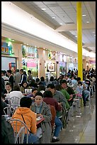 Vietnamese people in the foot court of the Grand Century mall. San Jose, California, USA (color)