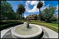 Wide view of fountain, gardens,  and mansion. Winchester Mystery House, San Jose, California, USA ( color)