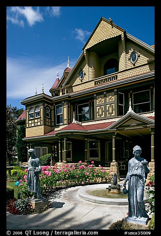 Statues, fountain, and facade. Winchester Mystery House, San Jose, California, USA (color)