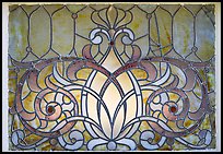 Decorated glass window. Winchester Mystery House, San Jose, California, USA (color)