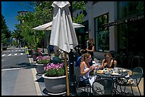 Street and outdoor restaurant tables. Santana Row, San Jose, California, USA (color)