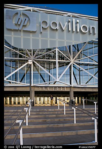 Facade of the HP Pavilion with person walking out. San Jose, California, USA (color)