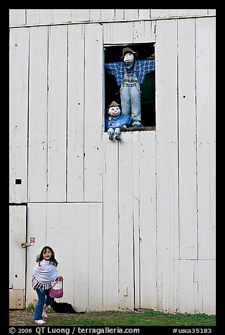 Girl and figures in barn window, Happy Hollow Farm, Rancho San Antonio Park, Los Altos. California, USA