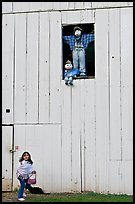 Girl and figures in barn window, Happy Hollow Farm, Rancho San Antonio Park, Los Altos. California, USA (color)