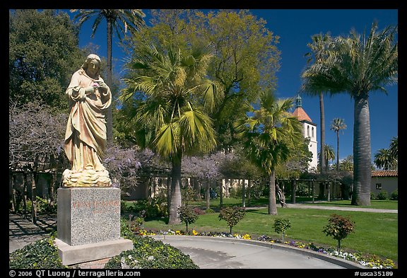 Statue, palm trees, and mission, Santa Clara University. Santa Clara,  California, USA (color)