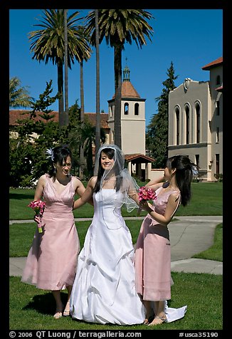 Bride and bridesmaids in front of mission, Santa Clara University. Santa Clara,  California, USA