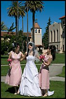 Bride and bridesmaids in front of mission, Santa Clara University. Santa Clara,  California, USA ( color)