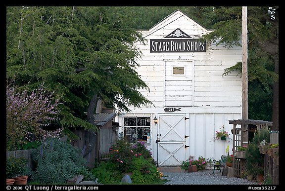 White-facaded store tucked in trees, Pescadero. San Mateo County, California, USA