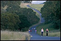 Women walking on trail, Stanford academic preserve. Stanford University, California, USA (color)