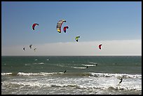 Group of kitesurfers, Waddell Creek Beach. California, USA