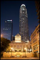 Los Angeles public library and US Bank building at night. Los Angeles, California, USA (color)