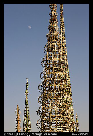 Simon Rodia Watts Towers and moon, late afternoon. Watts, Los Angeles, California, USA