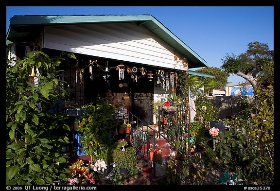 House and frontyeard, Watts. Watts, Los Angeles, California, USA