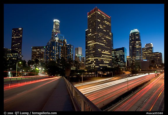 Bridge, Harbor Freeway, and skyline at nightfall. Los Angeles, California, USA