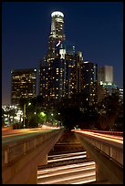 Bridge above Harbor Freeway and US Bank building at night. Los Angeles, California, USA ( color)